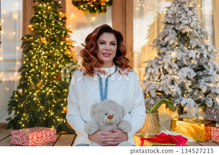 Woman Christmas Teddy Bear Holding Smiling Decorated Home Porch Holiday Season Woman Christmas Teddy Bear Holding Smiling Decorated Home Porch Holiday Season 134527215