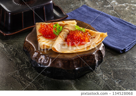Russain traditional pancakes with red caviar 134528068