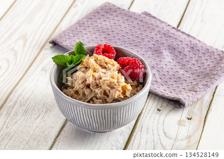 Oat porridge with raspberry Oat porridge with raspberry 134528149