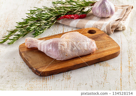 Raw whole chicken leg for cooking 134528154
