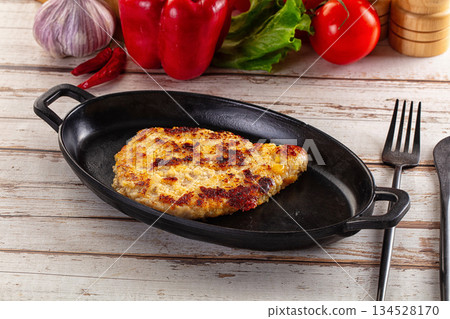 Breaded crispy chicken schnitzel Breaded crispy chicken schnitzel 134528170