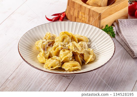 Tasty Russian dumplings with meat 134528195