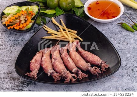 Boiled wild mini calamari snack 134528224