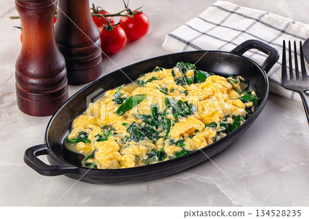 Omelette with spinach for breakfast Omelette with spinach for breakfast 134528235