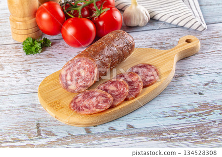 Salchichon pork cured sausages with parmesan Salchichon pork cured sausages with parmesan 134528308
