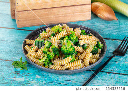 Italian vegan pasta fusilli with broccoli 134528336