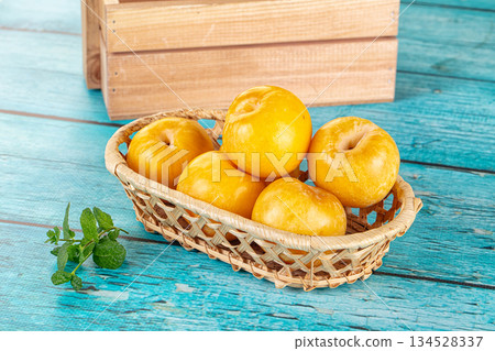 Raw ripe sweet yellow plums Raw ripe sweet yellow plums 134528337