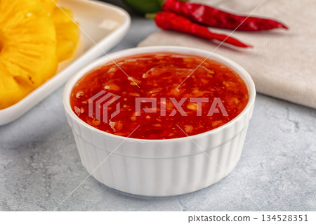 Sweet and spicy chili pineapple sauce 134528351