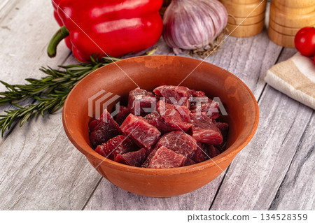 Raw beef meat cubes pieces 134528359