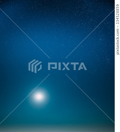 Blue Night Starry Sky With Moon Night View Of Natural Glowing Stars Blue Night Starry Sky With Moon Night View Of Natural Glowing Stars 134528859