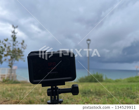 Capturing nature with an action camera mounted on a selfie stick, High quality photo Capturing nature with an action camera mounted on a selfie stick, High quality photo 134529911