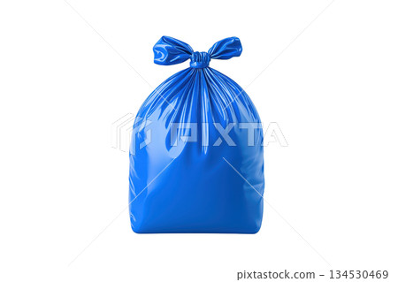 A glossy blue garbage bag tied at the top, showcasing a smooth surface and a distinct knot. 134530469