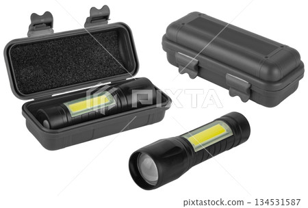hand-held LED flashlight, on white background in insulation 134531587