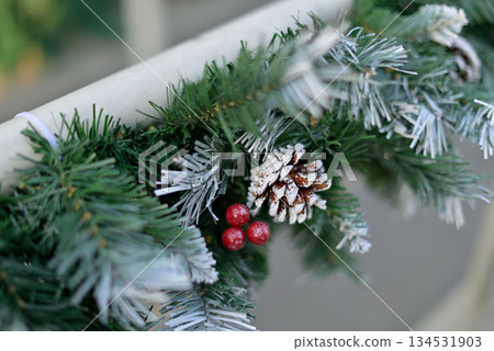 Christmas Garland with Pine Cones and Berries 134531903