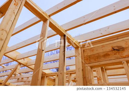 Scaffolding wooden beams frame are construction activity at building site 134532145