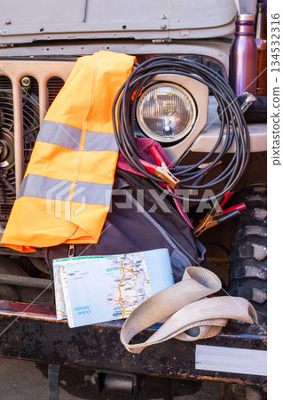 Car emergency kit with safety equipment for travel 134532316