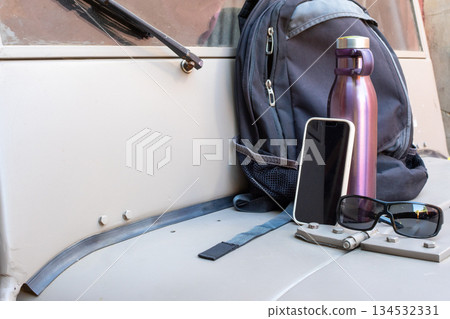 Travel essentials preparing for a road trip journey Travel essentials preparing for a road trip journey 134532331
