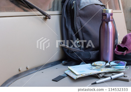Preparing for a road trip adventure with essential items Preparing for a road trip adventure with essential items 134532333