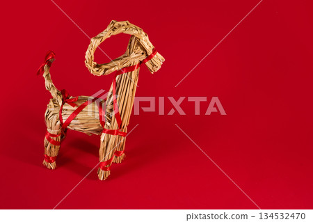Julbock Straw Goat on Red Background Julbock Straw Goat on Red Background 134532470