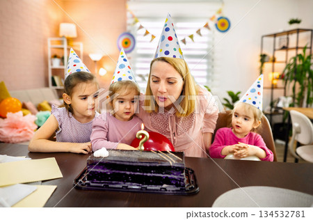 Joyful celebration with kids during a colorful birthday bash 134532781