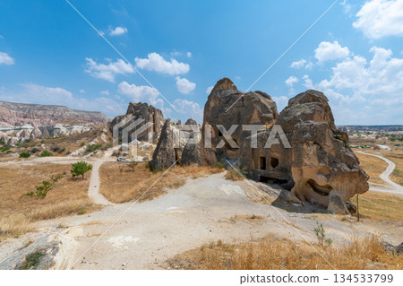 Volcanic rock formations landscape in Cappadocia, place of residence of ancient Christians Volcanic rock formations landscape in Cappadocia, place of residence of ancient Christians 134533799