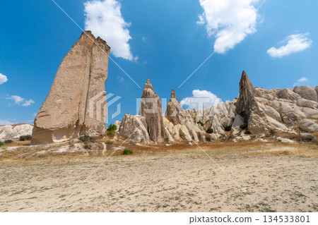 Volcanic rock formations landscape in Cappadocia, place of residence of ancient Christians Volcanic rock formations landscape in Cappadocia, place of residence of ancient Christians 134533801