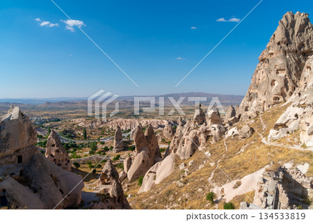 Volcanic rock formations landscape in Cappadocia, place of residence of ancient Christians 134533819