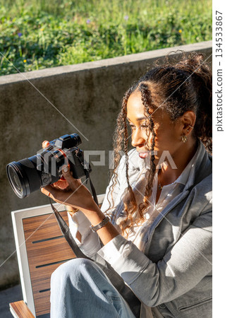 Smiling Photographer with Camera Smiling Photographer with Camera 134533867