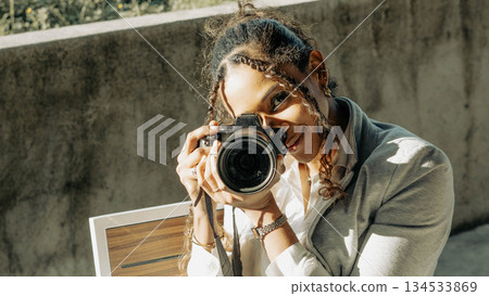 Woman Photographer with Camera Woman Photographer with Camera 134533869