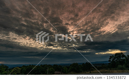 Dramatic and Cloudy Sky Over the Countryside Dramatic and Cloudy Sky Over the Countryside 134533872
