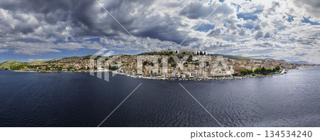 Sibenik old town panorama with St Michaels Fortress above Adriatic port under summer clouds Croatia Sibenik old town panorama with St Michaels Fortress above Adriatic port under summer clouds Croatia 134534240