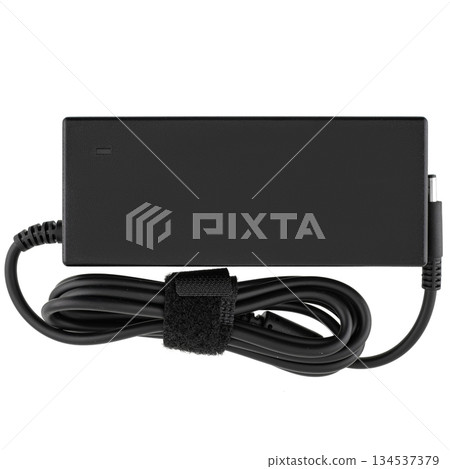 Laptop power adapter, on white background in insulation. Laptop power adapter, on white background in insulation. 134537379