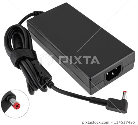 Power adapter for laptop, on white background in insulation Power adapter for laptop, on white background in insulation 134537450