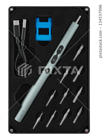 Cordless electric screwdriver with bit set, insulated on white background Cordless electric screwdriver with bit set, insulated on white background 134537996