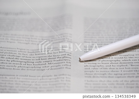 Close-up of an English newspaper and a pen Close-up of an English newspaper and a pen 134538349