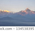 Sunrise over Machhapuchhre as seen from Sarangkot Observation Deck in Pokhara, Nepal Sunrise over Machhapuchhre as seen from Sarangkot Observation Deck in Pokhara, Nepal 134538395