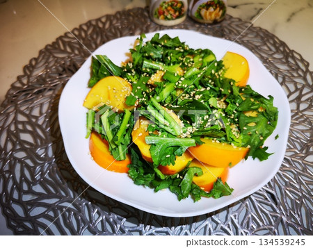 Persimmon and chrysanthemum salad Persimmon and chrysanthemum salad 134539245