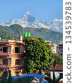 Pokhara, Nepal - View of the Himalayas and Machhapuchhre over the city Pokhara, Nepal - View of the Himalayas and Machhapuchhre over the city 134539783