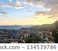 The cityscape and hills of Pokhara, Nepal at dusk The cityscape and hills of Pokhara, Nepal at dusk 134539786