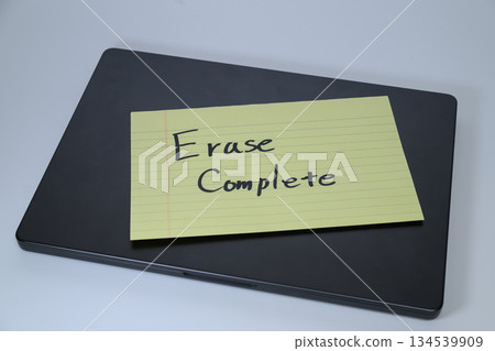 "Erase Complete" note on laptop 134539909
