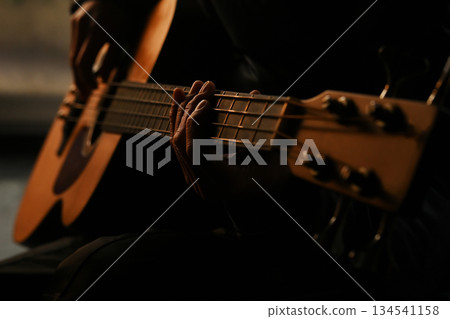 person playing bass 134541158