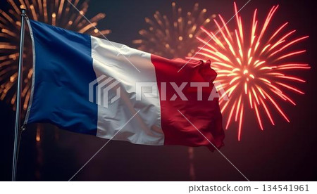 Colorful fireworks burst above the French flag, in a vibrant display of blue, white, and red 134541961