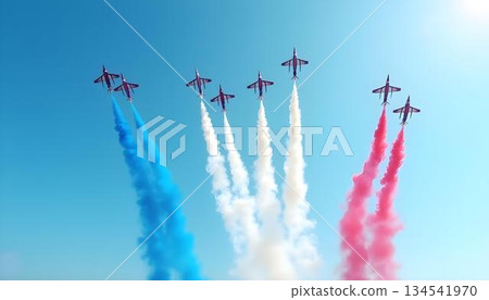 Aerial display of planes with red, white, and blue smoke 134541970