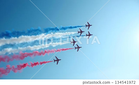 A group of planes flying in the sky, trailing red, white, and blue smoke 134541972