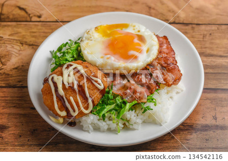 Bacon, eggs and croquettes lunch 134542116