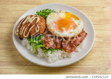 Bacon, eggs and croquettes lunch 134542123