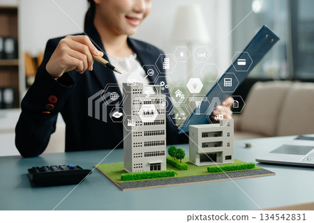 Considering buying a home, investing in real estate. Broker signs a sales agreement. agent, lease agreement, successful deal Considering buying a home, investing in real estate. Broker signs a sales agreement. agent, lease agreement, successful deal 134542831