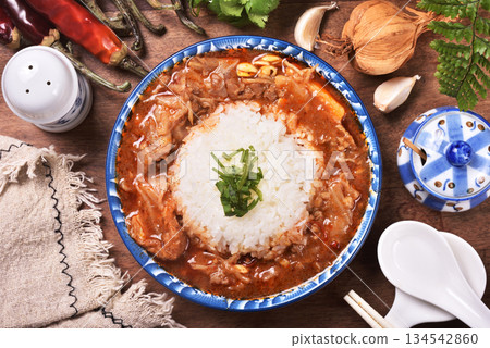 spicy sichuan-style braised beef on rice spicy sichuan-style braised beef on rice 134542860