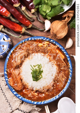 spicy sichuan-style braised beef on rice spicy sichuan-style braised beef on rice 134542861