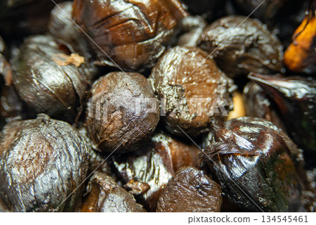 Black garlic made from jumbo garlic Black garlic made from jumbo garlic 134545461
